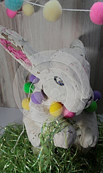 Easter bunny paper mache craft.. white, pink ears, possessed eyes