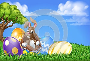 Easter Bunny Rabbit Breaking Out of Egg Cartoon photo