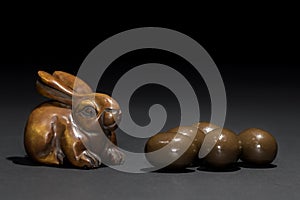 Easter bunny rabbit netsuke with mini Easter eggs