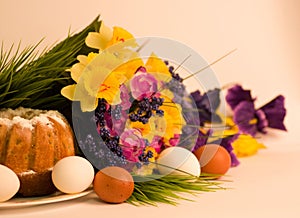 Easter cake with Easter eggs and spring flowers