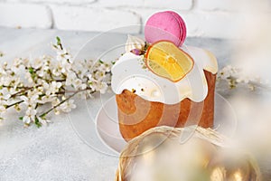 Easter cake and golden eggs on table