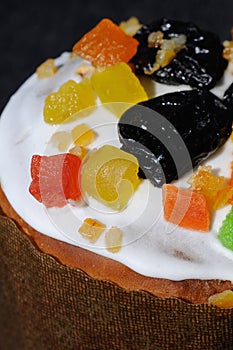 Easter cake sprinkled with sweets top view closeup