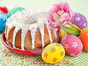 Easter cake, tulip and colorful eggs