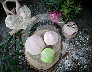Colored Easter cakes with a rim on a plate. Easter
