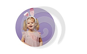 Easter card. Cute little child girl with bunny ears holding basket of Easter eggs. Child in a round hole circle in colored purple