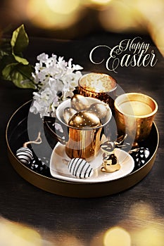 Easter card with decors in white and golden colors on black background