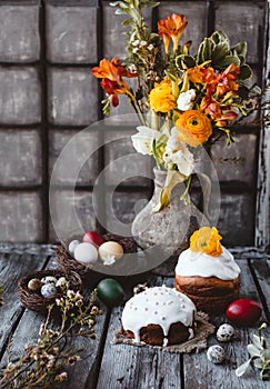 Easter celebrating table with Easter cakes and eggs