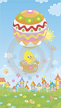 Easter Chick flying with a balloon