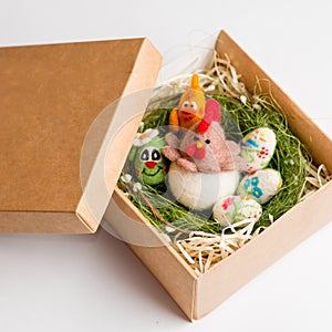 Easter chicken and eggs made of wool