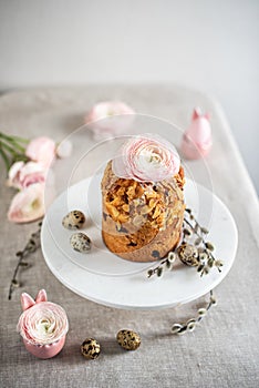 Easter composition with cake, eggs and flowers