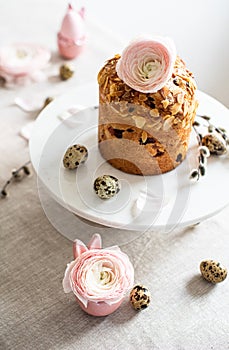 Easter composition with cake, eggs and flowers