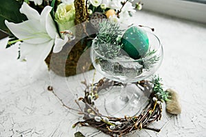 Easter composition with egg in the glass, the trend