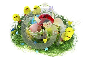 Easter composition with painted eggs, funny chickens and ladybug