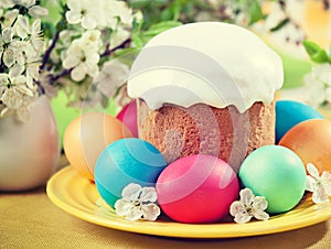 Easter concept - cake, eggs and cherry blossoms. Vintage retro