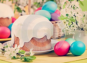 Easter concept - cake, eggs and cherry blossoms. Vintage retro h
