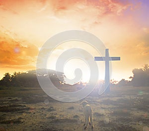 Easter concept:Silhouette cross on Calvary mountain sunset background.