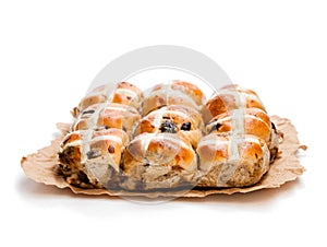 Easter cross buns and sultanas isolated on white background