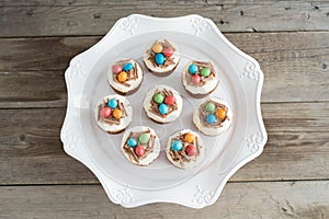 Easter cupcakes with chocolate frosting and candy eggs