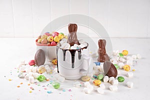 Easter cute hot chocolate mug with chocolate eggs and rabbit