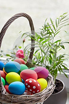 Easter Day, basket with colorful Easter Eggs