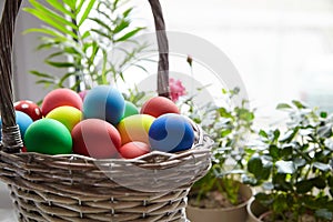 Easter Day, basket with colorful Easter Eggs