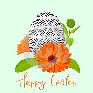 Easter decorated egg and calendula wreath. Ornamented festive egg with simple abstract ornaments. Spring holiday.