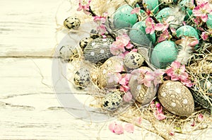 Easter decoration blue eggs pink flowers vintage toned