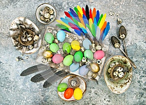 Easter decoration colored eggs birds feather