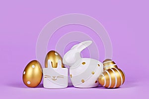 Easter decoration with easter bunny, golden eggs and egg cup