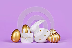 Easter decoration with easter bunny, golden eggs and egg cup