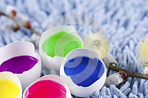 Easter decoration with egg shells and filled with tempera paints