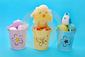 Easter decoration with eggs in three buckets