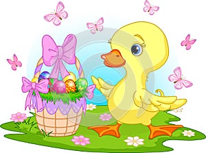 Easter duckling with a basket of eggs