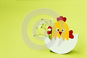 Easter. Easter decor. Decorative chicken on a light background. Easter decorations. Blank for a greeting card. Copy space