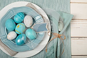 Easter Egg Dinner Place Setting in Nautical Colors of Teal Blue and Off Whites with Plates, Silverware, cloth Napkins and a Name T