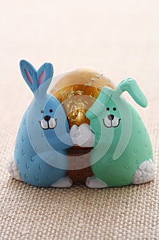 Easter egg in funny bunny and puppy eggcup