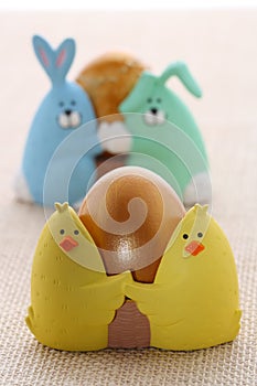 Easter egg in funny chick eggcup