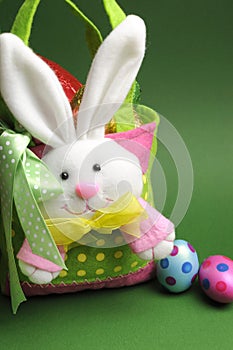 Easter egg hunt with colorful polka dot bunny carry basket bag