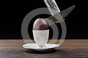 Easter egg open with a hammer