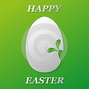 Easter egg with a rabbit on a green background
