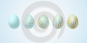 Easter egg Set of elegant modern luxury blue gold Easter eggs with a spiral lines pattern specks dots on a light background Egg