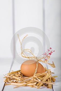 Easter egg on a white wooden background