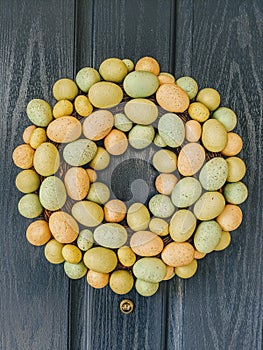 Easter egg wreath on a blue door