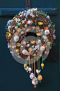 Easter egg wreath on wooden door