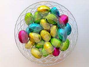 Easter eggs from above on white background