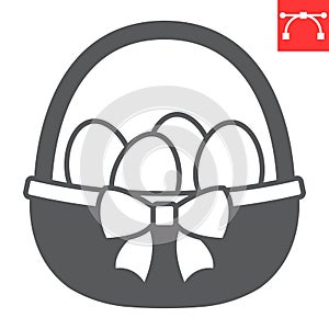 Easter eggs in basket glyph icon