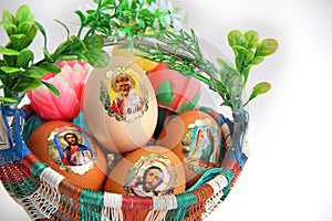 Easter eggs in basket on white background