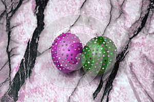 Easter eggs in beads in different colors .