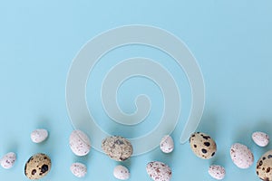 Easter eggs on the blue background.Flat lay style.