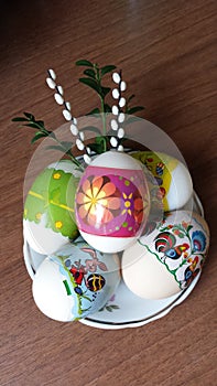 Easter eggs with boxwood and catkins